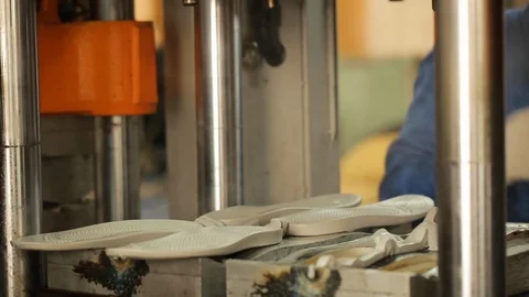 Close Up View Of Hands Pull Out The Rubber Soles From The Molding Shoe Soles. Stock-Footage 106858935