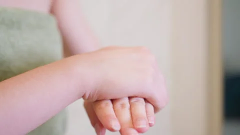 Close-Up View Of Hands Rubbing Together After Applying Cream Or Lotion Stock Footage 308594055