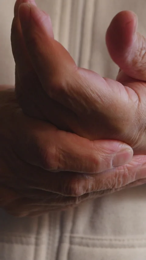A Close-Up View Of Hands Rubbing Together In Pain, Highlighting Discomfort And H Stock Footage 312981170