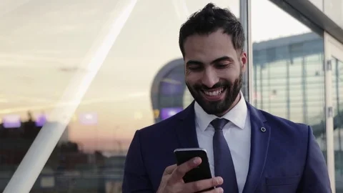 Close up view of handsome stylish bearded businessman using his smartphone. Stock Footage 81476622