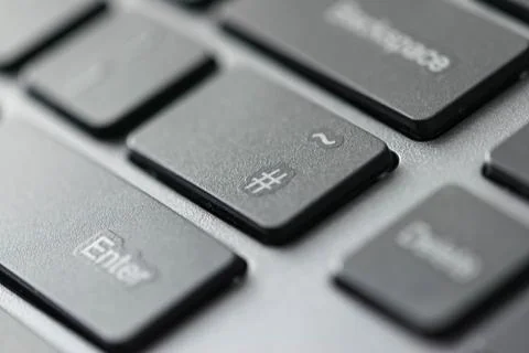 Close up view of hashtag icon on a computer keyboard keys Stock Photos