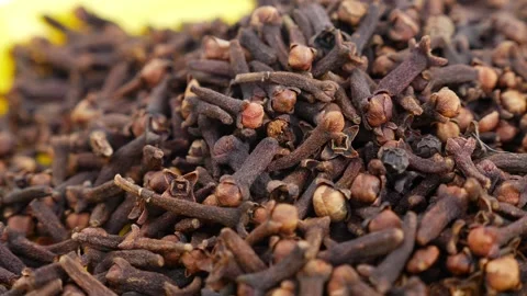 Close view of heap of cloves, Cloves placed in a plate Stock Footage 147691131