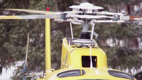 Close up View Of Helicopter Blades Spinning With Snow Stock Footage