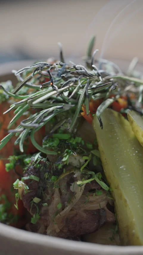 Close view of herb topped beef stew Stock Footage 324124530