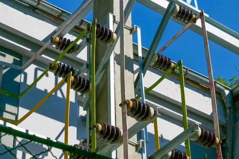 Close-up view of high voltage electrical insulators and power distribution .. 스톡 사진