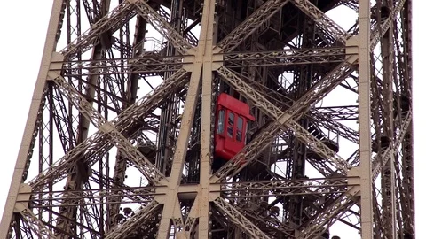 Close up view of higher elevators in Eiffel Tower Stock Footage 104456033