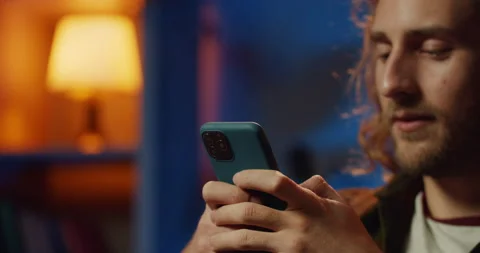 Close up view of hipster man face and hands typing message while communicating Stock Footage 132981431