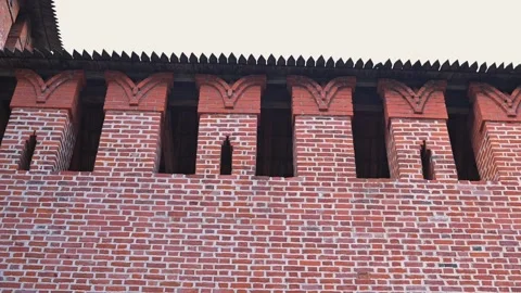 Close-up view of a historic fortress wall showing intricate brick patterns and Vidéo 344528016