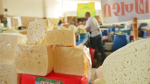 Close up view home made various cheeses on stalls in local market in Vanadzor Stock Footage 163081105