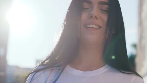 Close up view of hot and seductive young brunette woman playfully stroking her Stock Footage 111219869