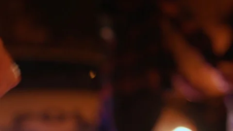 Close-up view of human hand showing handcuffs on background of lighted city Stock Footage 112996621