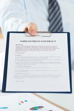 Close up view of human resources manager offering employment contract Stock Photos