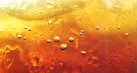 Close up view of the ice and bubble in cola. Stock Photos