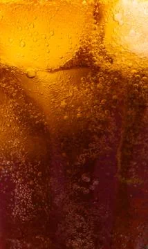 Close up view of the ice cubes in cola background Stock Photos