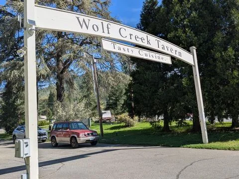 Close view of the iconic Wolf Creek Tavern overhead sign Stock Photos