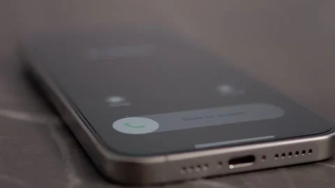 Close up view of incoming call on smartphone with options to answer or decline Stock Footage 334044428