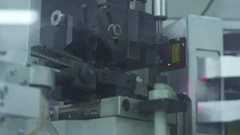 Close-up view of an industrial cable cutting machine Stock Footage 321896688
