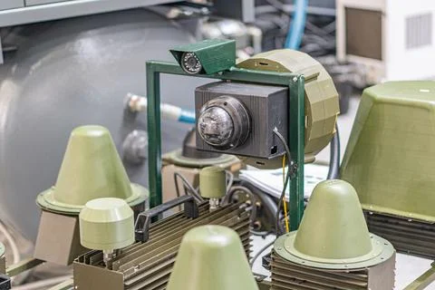 Close-up view of an industrial facility, featuring a green and metallic mac.. Stock Photos