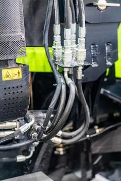 Close-up view of an industrial machine in soft light, metallic and dark color Stock Photos