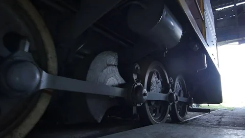 Close View of Industrial Train Moves Toward Workshop Exit Stock Footage 74515476