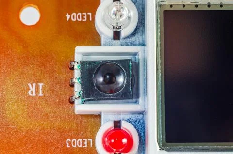 Close-up view of an infrared sensor and LEDs on a circuit board Stock Photos
