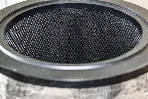 Close-up view of the inner side of a dirty cylindrical air purifier filter .. Stock Photos