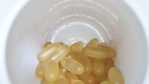 Close-up view inside jar of omega 3 Video stock 156515214