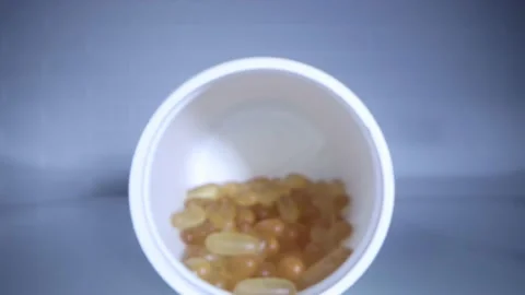 Close-up view inside jar of omega 3 Video stock 156515282