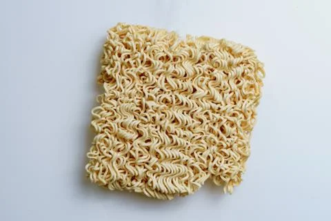 A close up view of a instant noodle cubes and white background Stock Photos