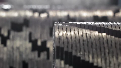 Close-up view of interlocking metal cutting teeth arranged in staggered pattern Stock Footage 306408113