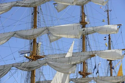 Close-up view of the intricate rigging, masts, and sails of a tall ship Stock Photos