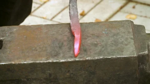 Close up view of iron hammering by hands. Stock Footage 133347935