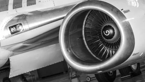 Close-up view of the jet engine of the aircraft. Black and white photo. Stock Photos