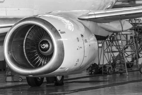 Close-up view of the jet engine of the aircraft. Black and white photo. Stock Photos