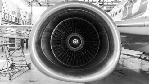 Close-up view of the jet engine of the aircraft. Black and white photo. Stock Photos