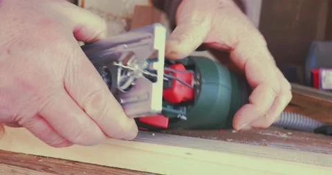 Close up view of a jigsaw from which the wood cutting blade is removed. Selec Vídeo Stock 152582892