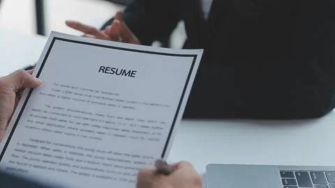 Close up view of job interview in office, focus on resume writing tips, emp.. Video stock 237776448