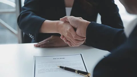 Close up view of job interview in office, focus on resume writing tips, emp.. Stock Footage 237776485