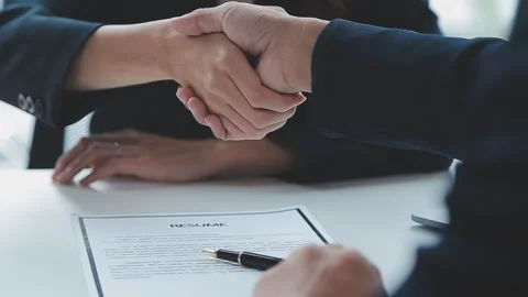 Close up view of job interview in office, focus on resume writing tips, emp.. Stock Footage 237776486