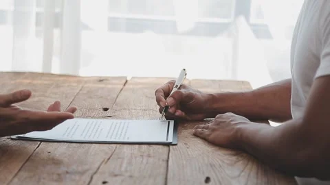 Close up view of job interview in office, focus on resume writing tips, emp.. Stock Footage 252210816