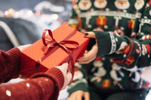 Close-up view of kid giving present to mother Stock Photos