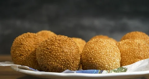 Close view of a kid hand pick up a traditional asian style glutinous rice bal Stock Footage 94453210