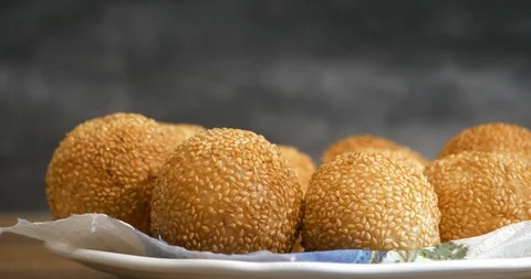 Close view of a kid hand pick up a traditional asian style glutinous rice bal Video stock 94453323