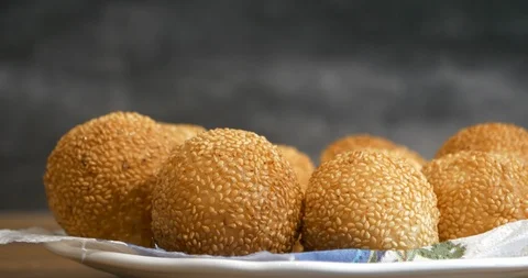 Close view of a kid hand pick up a traditional asian style glutinous rice bal Stock Footage 94453326