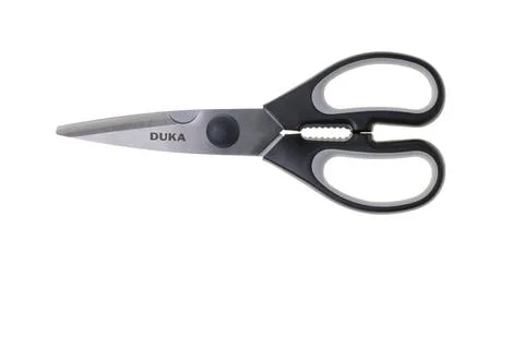 Close up view of kitchen scissors isolated on white background. Stock Photos