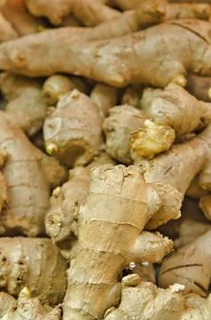Close-up view of knobbly ginger roots piled together Stock Photos