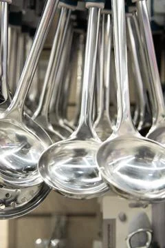 Close up view of Ladles at store . Vertical shot Stock Photos