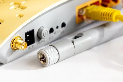 Close-up view of LAN network switch connectors with Ethernet cables attache.. Foto stock