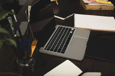 Close-up view of laptop with blank screen and graphics tablet at designer wor Stock Photos
