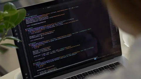 Close view of laptop screen filled with programming code. Vibe coding Видео 345652051